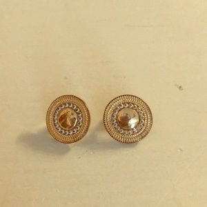 Gold stud earrings